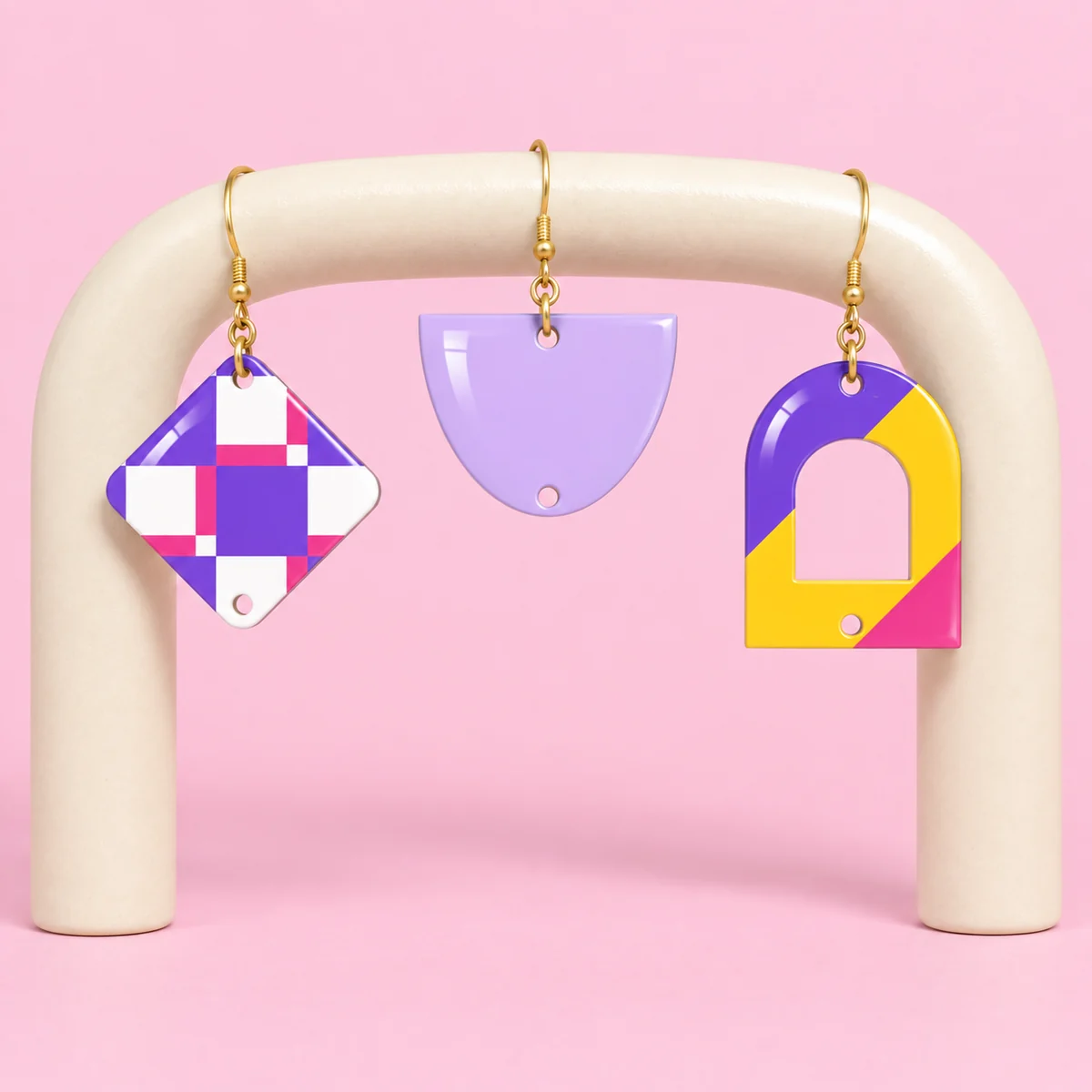 Orecchini Mezzaluna lilla · I tre pezzi